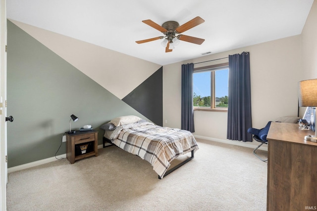 bedroom with carpet floors, a ceiling fan, baseboards, and visible vents