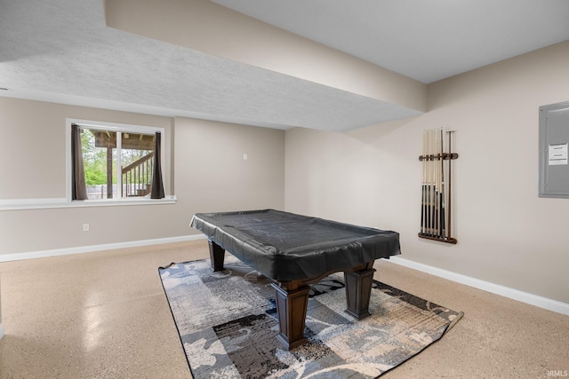 rec room featuring baseboards, electric panel, and pool table