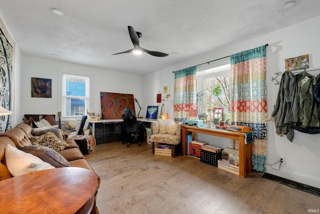 2819 Witchwood Dr, Fort Wayne, IN 46809 - living room featuring a ceiling fan, a textured ceiling, plenty of natural light, and wood finished floors