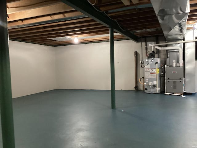 basement with heating unit and water heater