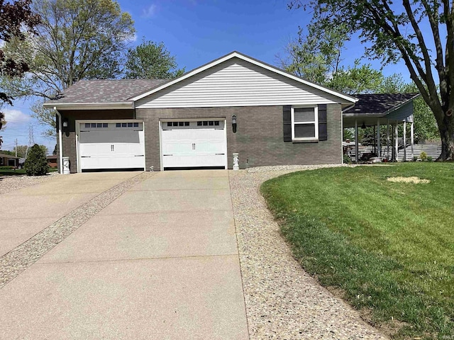 view of side of property with concrete driveway, brick siding, an attached garage, and a lawn