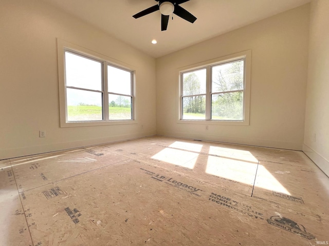 unfurnished room featuring a ceiling fan