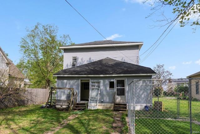 view of front of property featuring fence, a front yard, and entry steps