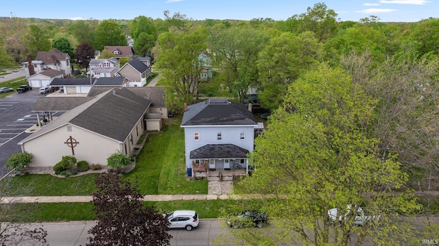 bird's eye view with a residential view and a wooded view