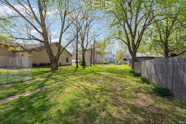 view of yard with fence