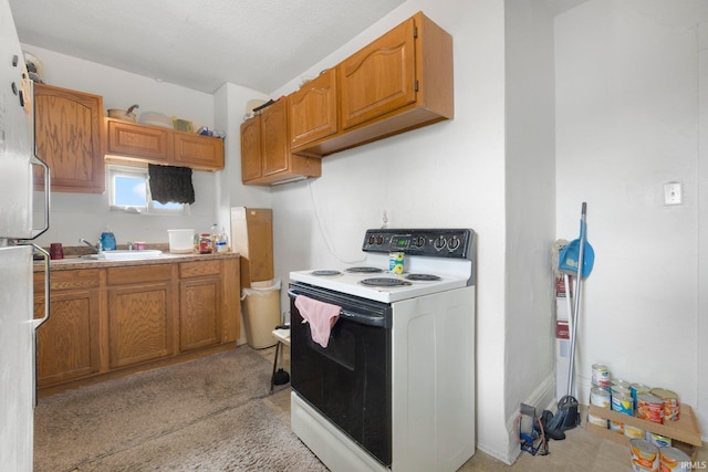 kitchen featuring light countertops, white range with electric stovetop, light colored carpet, and brown cabinetry