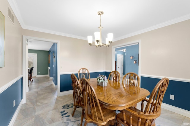 1206 Phaeton Way, Auburn, IN 46706 - dining area featuring an inviting chandelier, ornamental molding, and visible vents