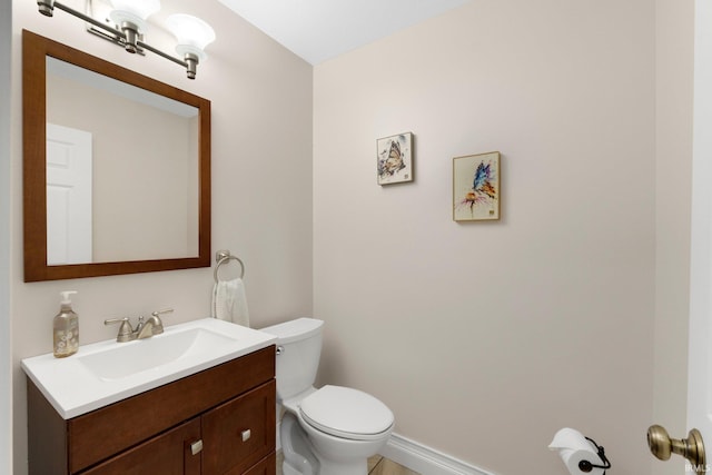 1206 Phaeton Way, Auburn, IN 46706 - bathroom with vanity, baseboards, toilet, and tile patterned flooring