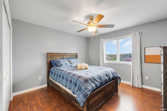 1206 Phaeton Way, Auburn, IN 46706 - bedroom with baseboards, a ceiling fan, and wood finished floors