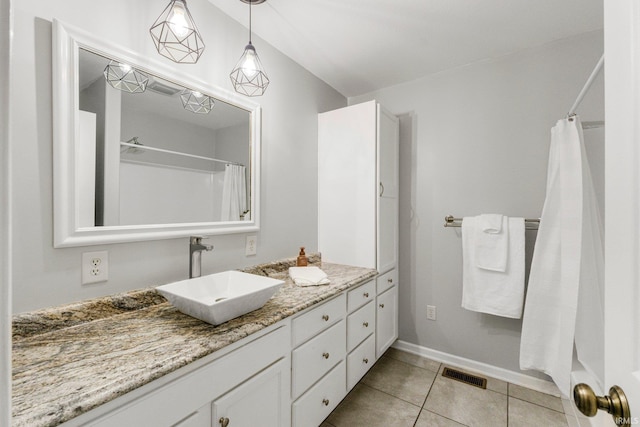 1206 Phaeton Way, Auburn, IN 46706 - full bath with baseboards, visible vents, tile patterned flooring, and vanity