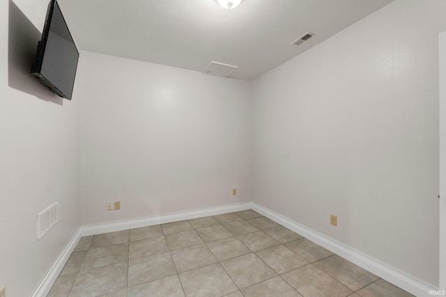 1206 Phaeton Way, Auburn, IN 46706 - empty room with baseboards, visible vents, and light tile patterned floors