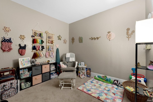 playroom featuring carpet flooring