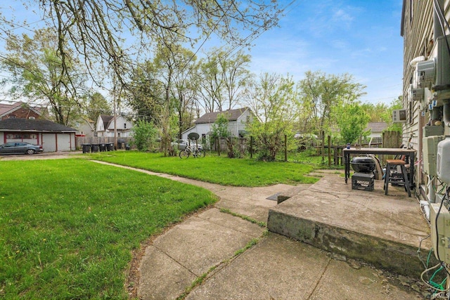 view of yard with fence and a residential view