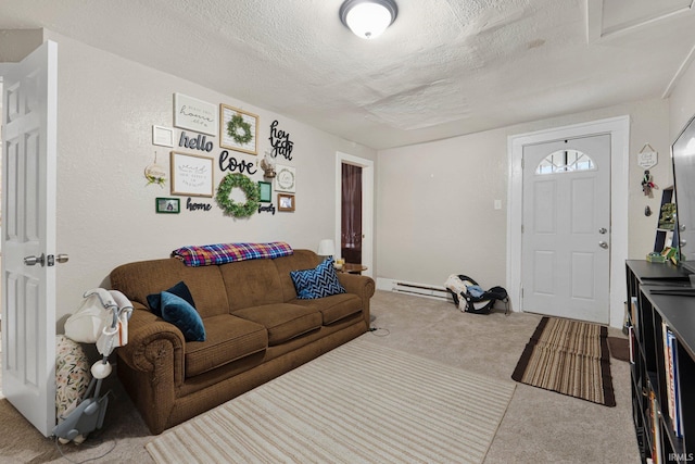 living room featuring carpet flooring, a textured ceiling, and baseboard heating