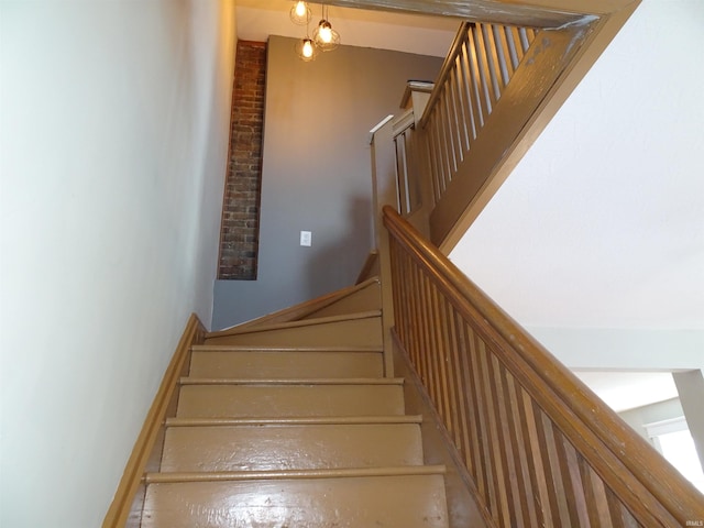 staircase with baseboards