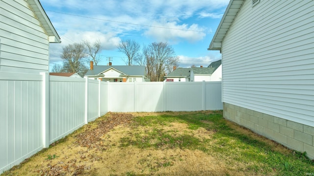 view of yard with fence