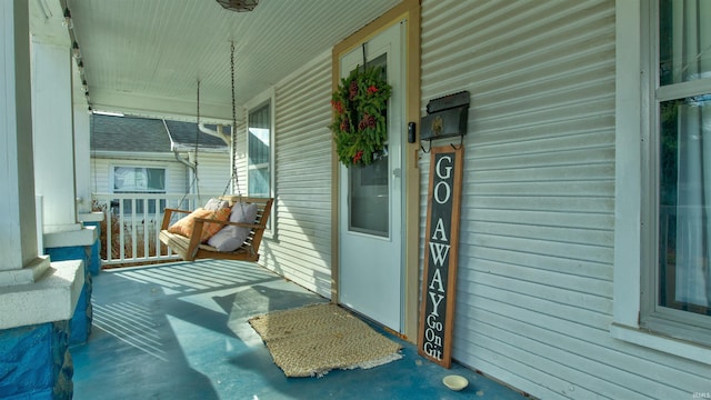 entrance to property with a porch