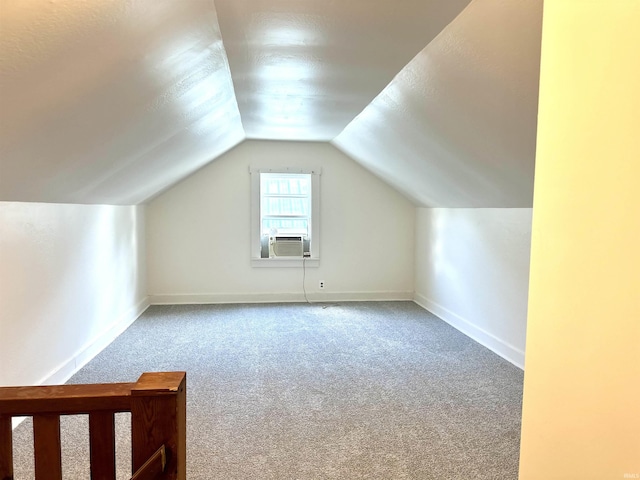 1045 13th St, Tell City, IN 47568 - bonus room featuring baseboards, lofted ceiling, carpet, and cooling unit