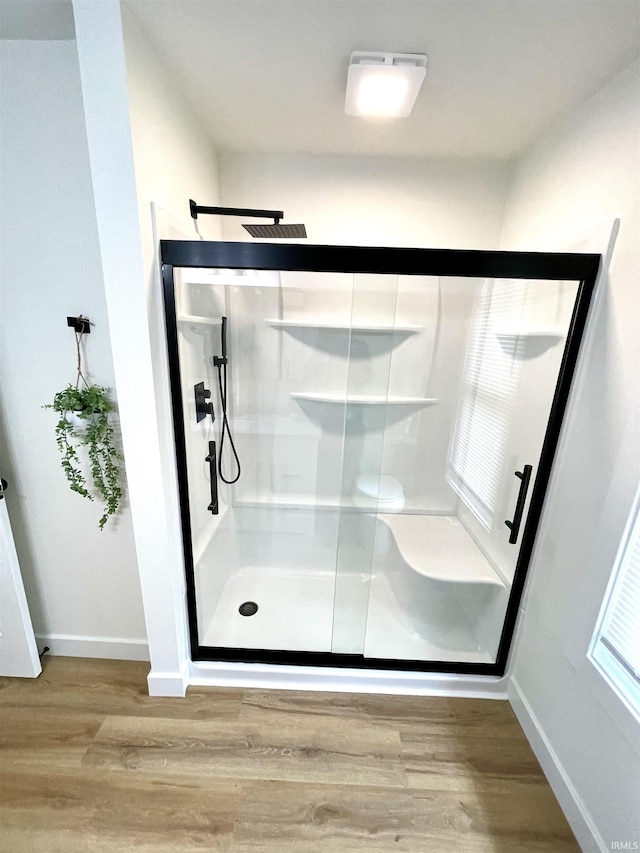 4970 S 700 W, Owensville, IN 47665 - full bathroom featuring wood finished floors, a shower stall, and baseboards