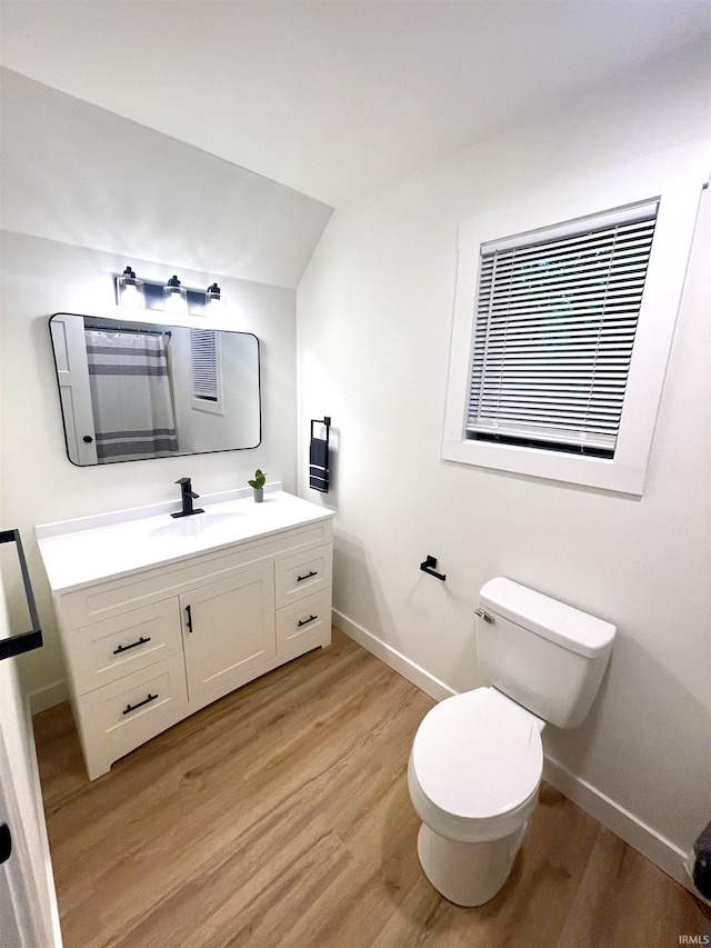 4970 S 700 W, Owensville, IN 47665 - bathroom with baseboards, wood finished floors, vanity, and toilet
