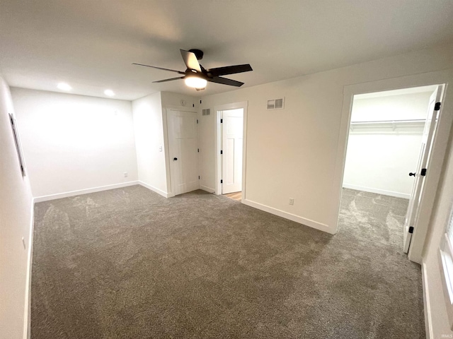 4970 S 700 W, Owensville, IN 47665 - unfurnished bedroom featuring carpet, baseboards, recessed lighting, a spacious closet, and a ceiling fan
