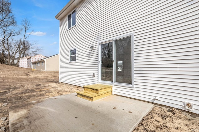 back of house featuring a patio