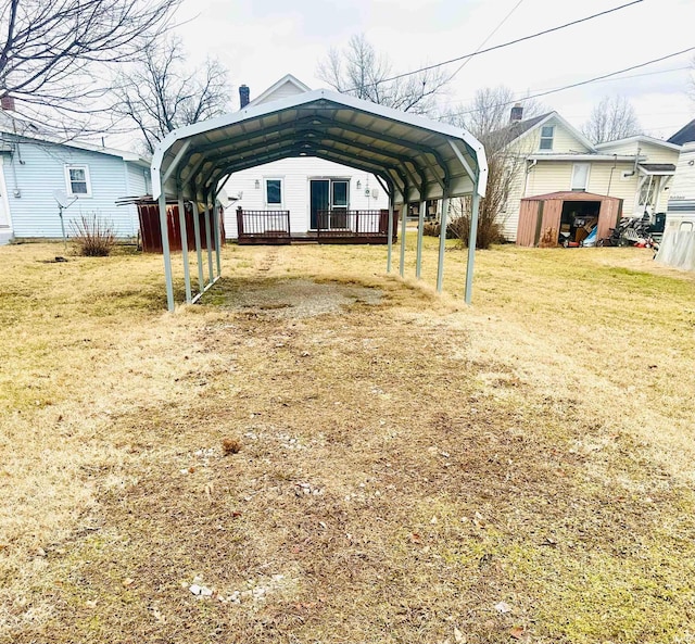 1037 14th St, Tell City, IN 47568 - view of vehicle parking with a storage shed, driveway, and a carport