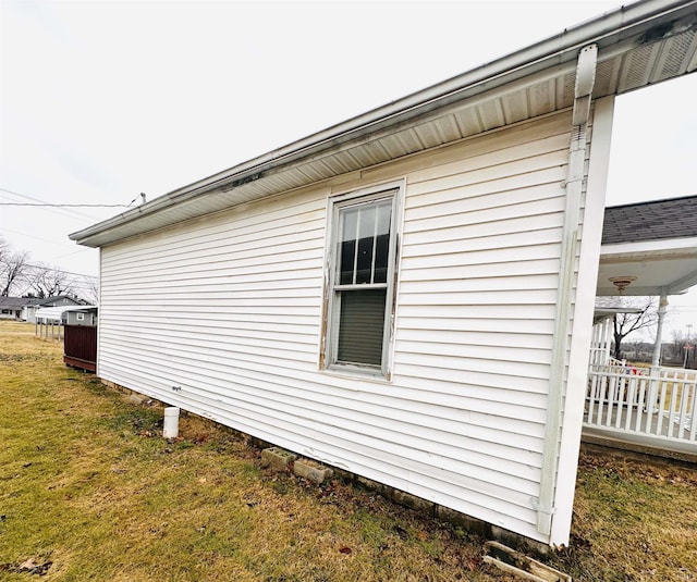 1037 14th St, Tell City, IN 47568 - view of side of home featuring a yard