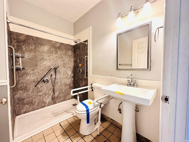 1037 14th St, Tell City, IN 47568 - bathroom featuring tile patterned flooring, a shower stall, and toilet