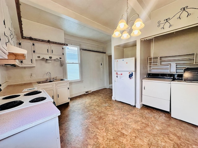 1037 14th St, Tell City, IN 47568 - kitchen featuring light countertops, a chandelier, freestanding refrigerator, light floors, and under cabinet range hood