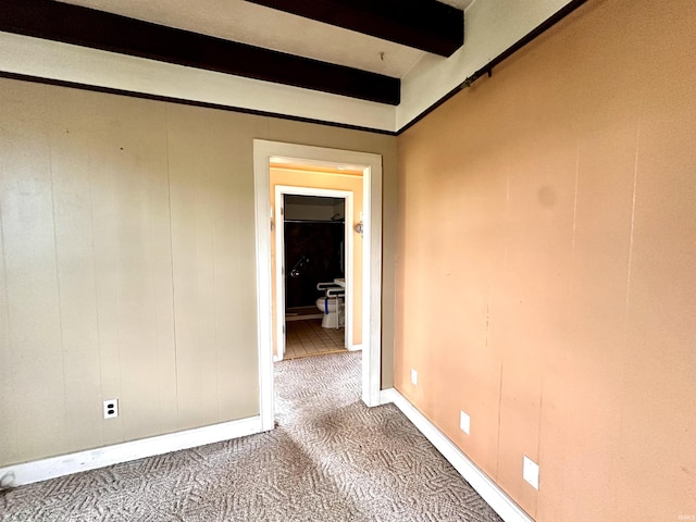 1037 14th St, Tell City, IN 47568 - carpeted empty room featuring beamed ceiling and baseboards