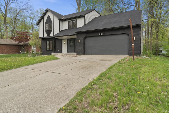 view of front of home with a front lawn, roof with shingles, brick siding, concrete driveway, and an attached garage