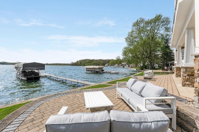 275 Ln 101 Hamilton Lk, Hamilton, IN 46742 - view of patio with a boat dock, a water view, and an outdoor living space