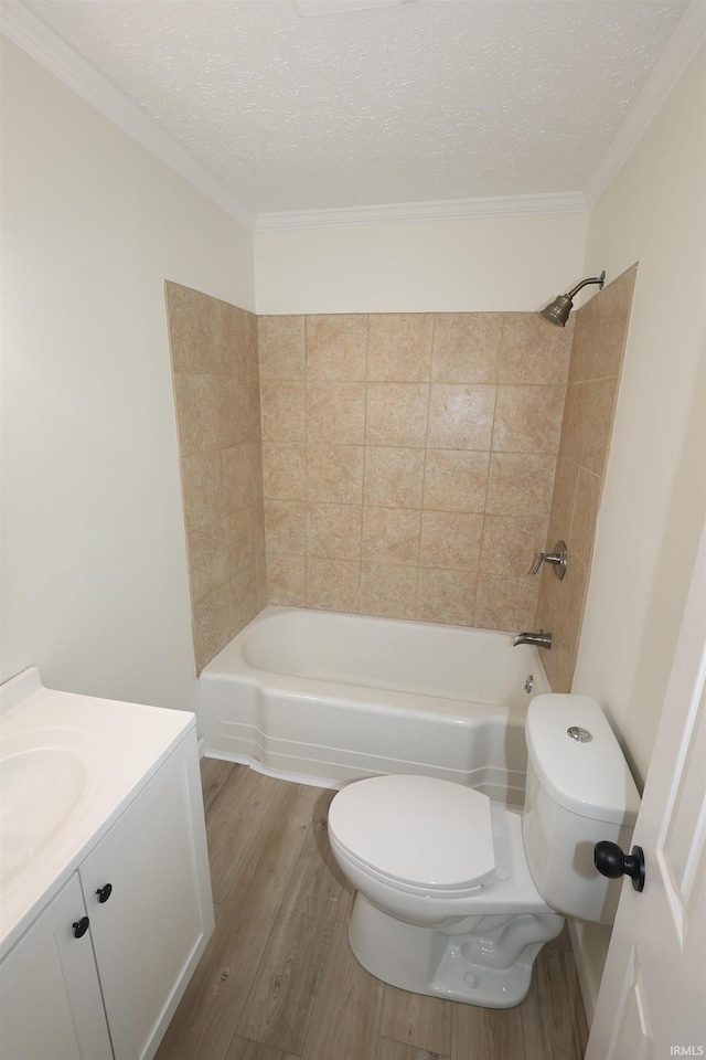 full bathroom featuring shower / tub combination, a textured ceiling, wood finished floors, and toilet