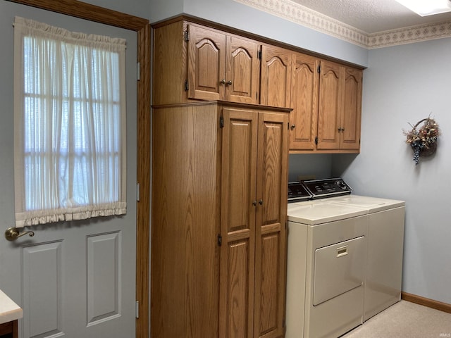 760 N 700 E, Bluffton, IN 46714 - laundry area featuring baseboards, washing machine and dryer, and cabinet space