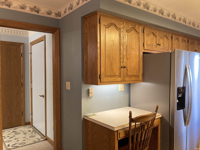 760 N 700 E, Bluffton, IN 46714 - kitchen featuring light countertops, brown cabinetry, and stainless steel fridge