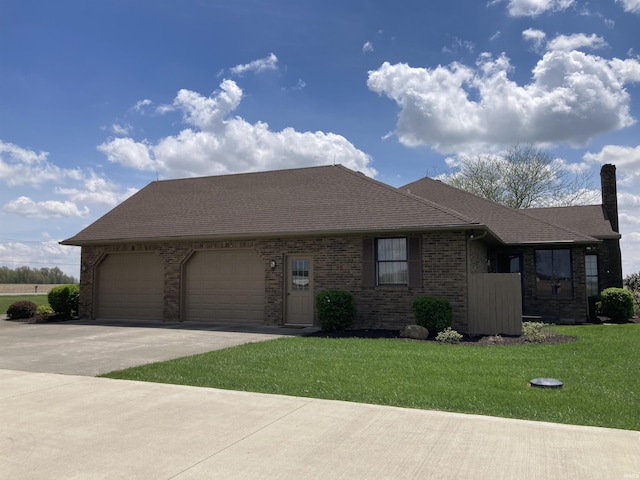 760 N 700 E, Bluffton, IN 46714 - ranch-style home with a chimney, a front yard, brick siding, aphalt driveway, and an attached garage