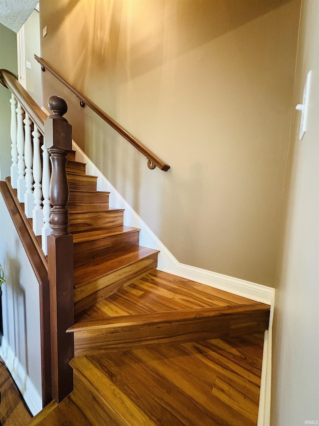 3701 Wethersfield Dr, Evansville, IN 47725 - stairs featuring baseboards and wood finished floors