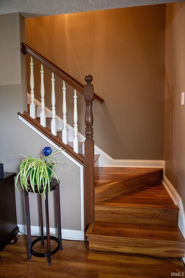 3701 Wethersfield Dr, Evansville, IN 47725 - stairway featuring wood finished floors and baseboards