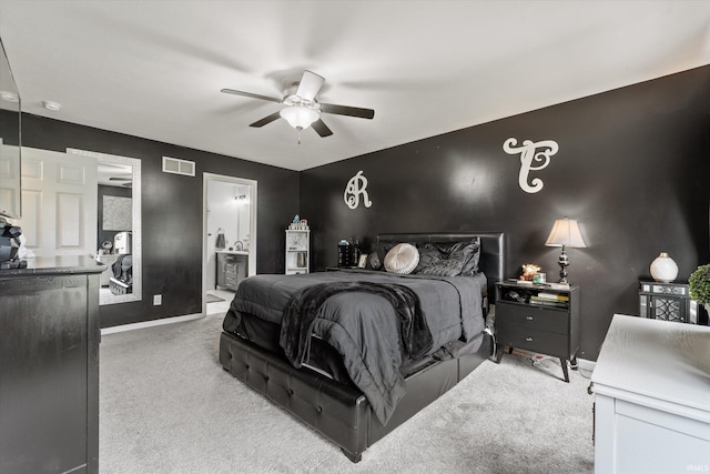 29930 Prairieview Farms Blvd, Elkhart, IN 46514 - carpeted bedroom with baseboards, visible vents, ceiling fan, and ensuite bath