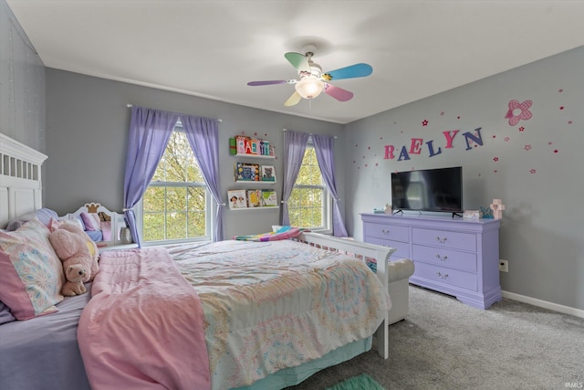 29930 Prairieview Farms Blvd, Elkhart, IN 46514 - bedroom with baseboards, a ceiling fan, and light colored carpet