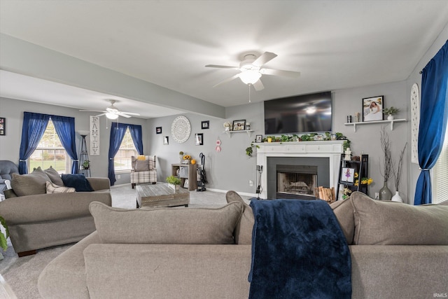 29930 Prairieview Farms Blvd, Elkhart, IN 46514 - carpeted living room featuring ceiling fan, baseboards, and a fireplace