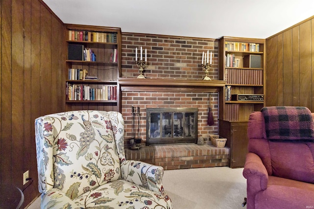 4231 N Conner Dr, Marion, IN 46952 - living room featuring wooden walls, carpet floors, and a brick fireplace