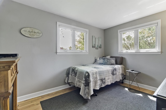 4231 N Conner Dr, Marion, IN 46952 - bedroom featuring baseboards and wood finished floors