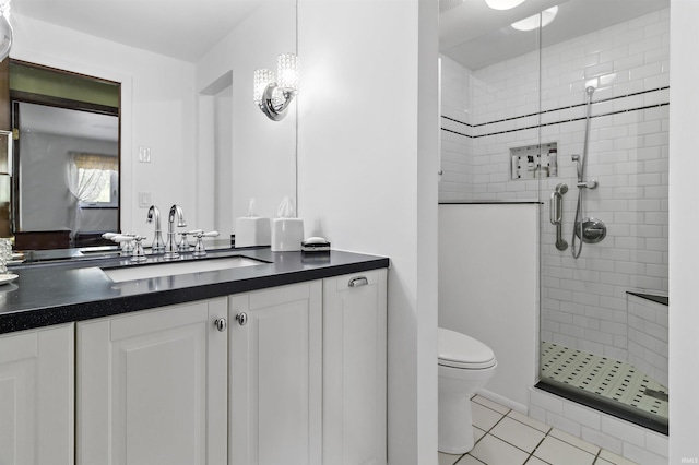 4231 N Conner Dr, Marion, IN 46952 - full bathroom featuring toilet, a shower stall, tile patterned flooring, and vanity