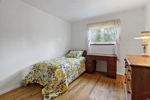 4231 N Conner Dr, Marion, IN 46952 - bedroom with wood-type flooring and baseboards