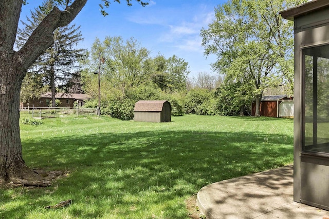 4231 N Conner Dr, Marion, IN 46952 - view of yard with a storage shed and an outdoor structure