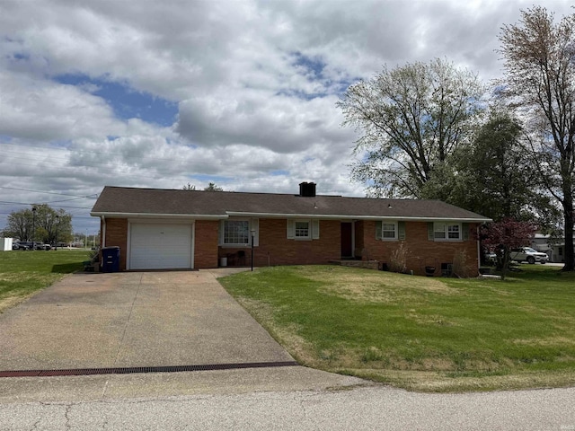 ranch-style house featuring an attached garage, driveway, and a front lawn