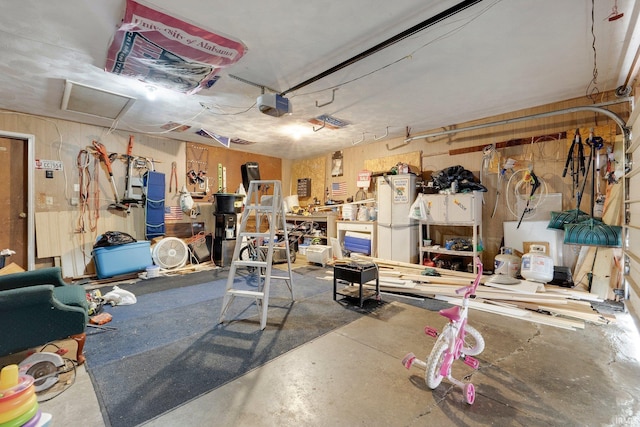 garage featuring a garage door opener
