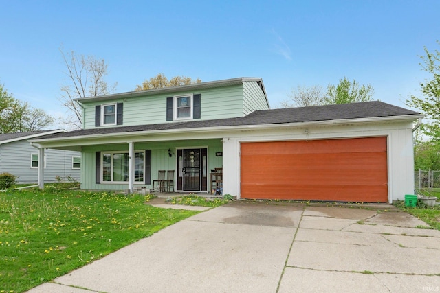 traditional-style home featuring an attached garage, a front lawn, board and batten siding, covered porch, and driveway